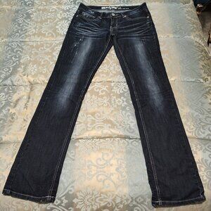 Machine slightly distressed blue jeans, excellent used condition, size 5